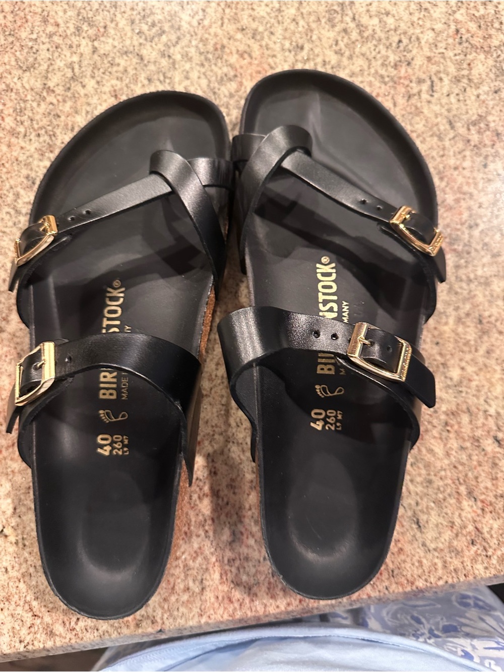 Birkenstock Women's Black Cross-Strap Sandals with Gold Buckles